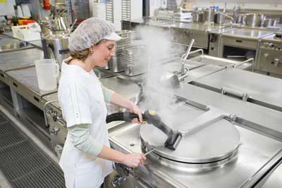 Steam cleaning kitchen food preparation area